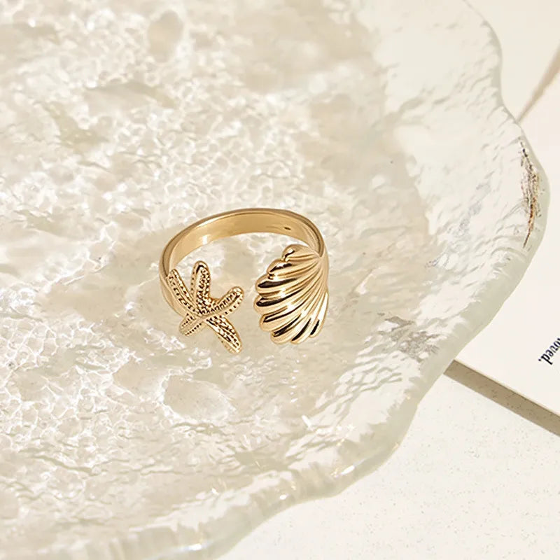 Anillo Marina Dorada Ajustable | Estrella de Mar y Concha